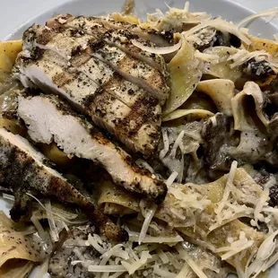 Pappardelle Funghi with grilled chicken! Pappardelle, grilled chicken, roasted mushrooms, cream, black truffle pate.  Very good.