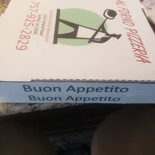 a pizza box on a table