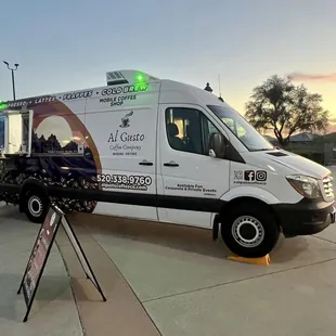 a coffee truck parked in a parking lot