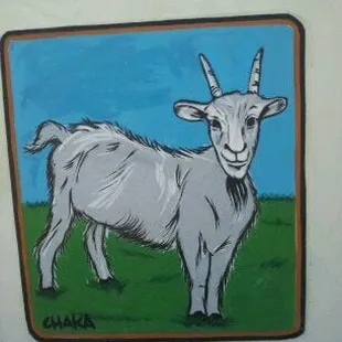 a goat painted on a wall