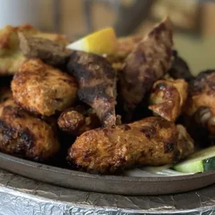 a plate of chicken wings