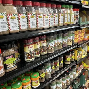 shelves of spices in a grocery store