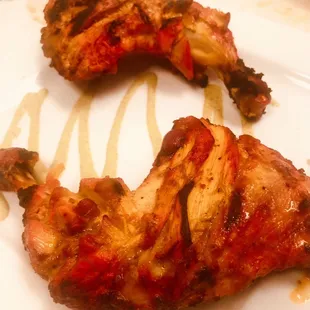 Fired chicken Tandoor on a open grill to perfection