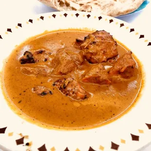Chicken Tikka Masala. $7.99. I had.it with naan. Tasted spicy. Just the way I like it. One naan would fill you up.