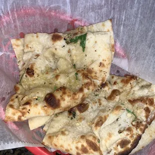 a basket of flatbreads