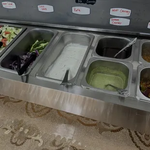 Salad, dressing, and sauces. The mango and mint chutney were very good.