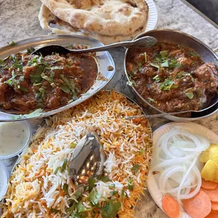 Chicken biriyani Karahi gosht (goat) - so good, must try. Highly recommended *** Special Chicken karai Plain naan
