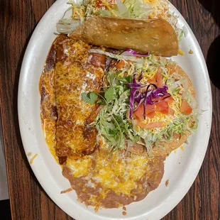 #4 combo hard shell shredded beef taco, cheese enchilada, and bean tostada with beans no rice please ! So good!