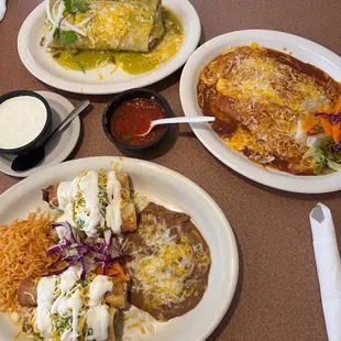 Chili Verde Wet Burrito, Red cheese enchiladas, Flautitas, and a side of sour cream. Love the salsa here!