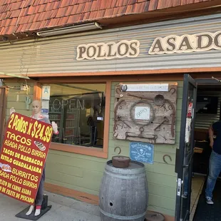 the entrance to pollo asados