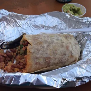 Stumbled onto this gem the aroma will get you here. This Al Pastor burrito and fresh guac is so delicious