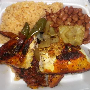 Half chicken,rice,beans,grilled onions/serranos also comes with corn tortillas and salsa. Everything was seasoned well &amp; so good