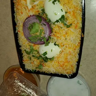 a dish of rice and onions