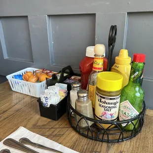 A good selection of condiments available to choose from.