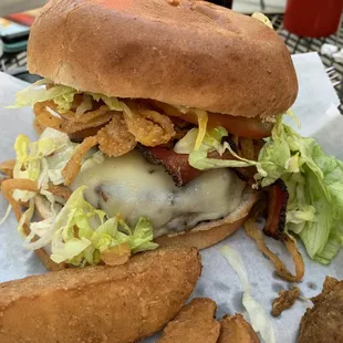 Woodys burger the side view good luck biting this one!