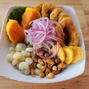 Ceviche Carretillero -  Traditional Ceviche with fried Calamari.