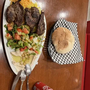 Lamb shops come with rice, hummus &amp; salads, delicious.