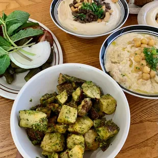 a bowl of hummus and a bowl of hummus