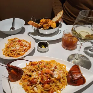 Lobster spaghetti and seafood stew.