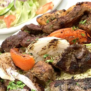 a plate of meat and vegetables