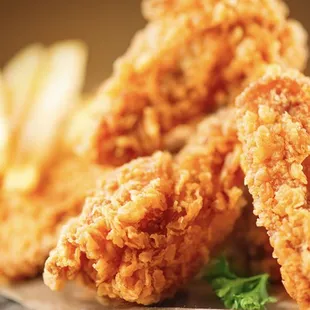 fried chicken nuggies and french fries