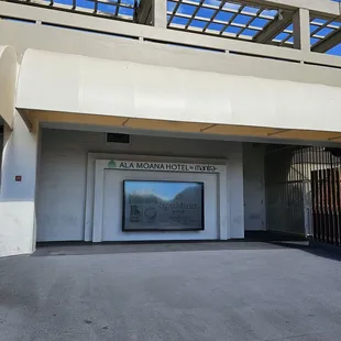 After walking up the ramp between Ala Moana Center and Ala Moana Hotel, turn left at this informational board