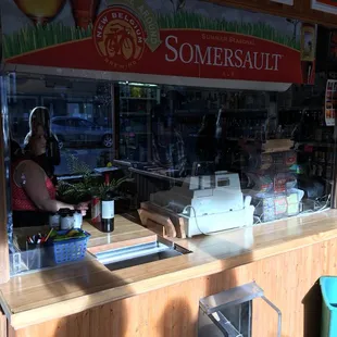 a woman behind the counter