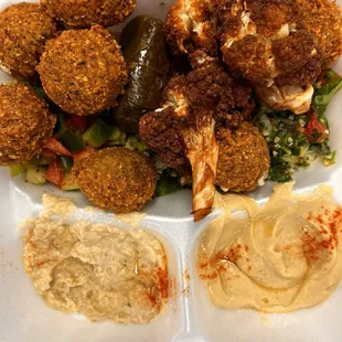 Vegetarian Mezza plus grilled cauliflower. Tabouli &amp; salad hiding