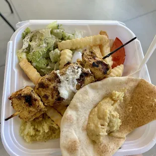 Ordered just a chicken skewer, but generous owner gave a lot of freebies! Pita, hummus, fries, rice, salad!