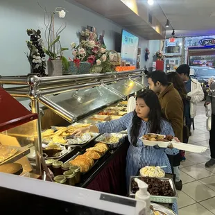 a woman serving food