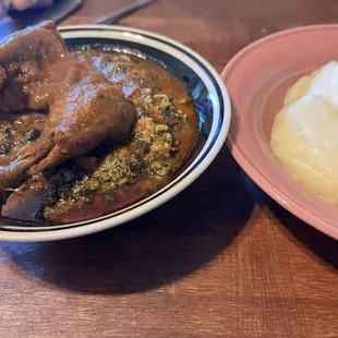 Egusi soup with chicken and fufu