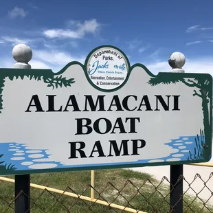 Sign at entrance to park and boat ramp.