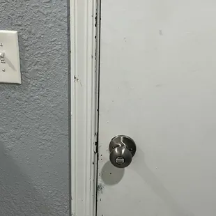 Filthy bathroom door and trim