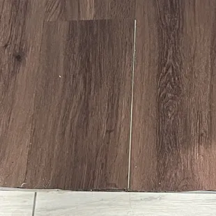 Half installed peel and stick flooring