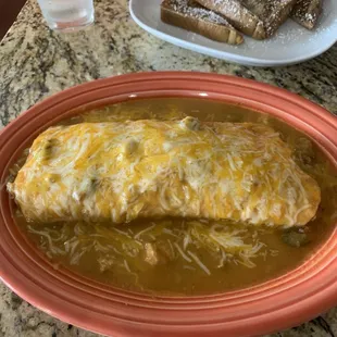 The enormous steak breakfast burrito.