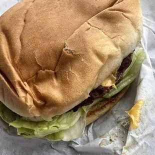 CHEESEBURGER - $7.99 - Fresh ground chuck USDA, Mayo, Mustard, Lettuce, Tomato, Onion, and of course Cheese.