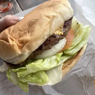 CHEESEBURGER - $7.99 - Fresh ground chuck USDA, Mayo, Mustard, Lettuce, Tomato, Onion, and of course Cheese.