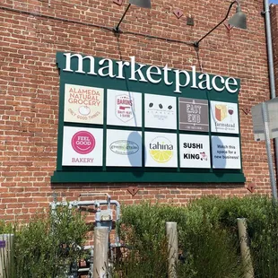 a brick building with a sign that says marketplace
