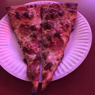 Slice of pepperoni and sausage