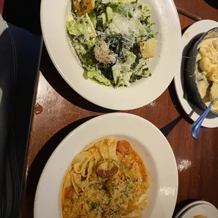 Caesar salad and the spicy crab pasta