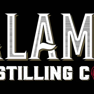 the logo for alamo distilling co