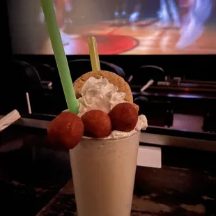 Big Freakin' Cookie Shake  It has: 3 Cinnamon Donuts 1 Snickerdoodle Cookie 1 Churro Stick 1 Cinnamony Sugary Shake