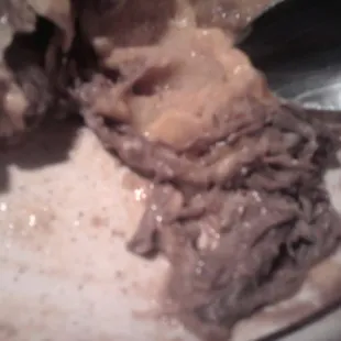 Inside my Beef Enchilada. (Shredded Beef, No Ground) little dry.