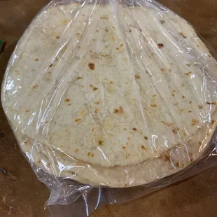 a tortilla wrapped in plastic