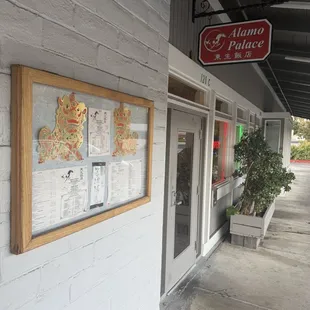 Main entrance it's kinda tucked away you can easily miss it's neighbors Hi Tech Burrito