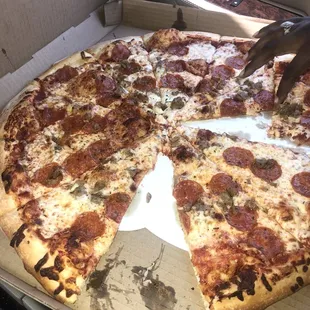 Pepperoni and sausage Texas size pizza