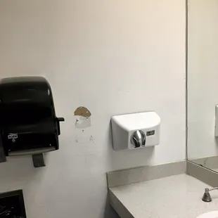 Men's restroom damage