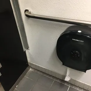 Filthy men's restroom.  Blood or something that has been there a year