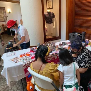 Balloon twister and face painting station