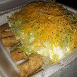 5 rolled tacos special comes with small soda